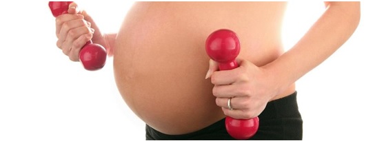 pregnant mom with dumbbells