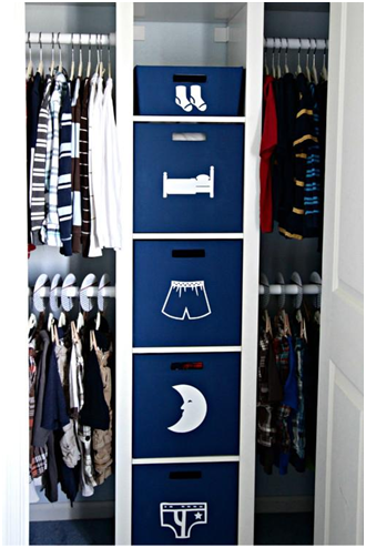 boys' closet with decorated bins for different categories of clothes