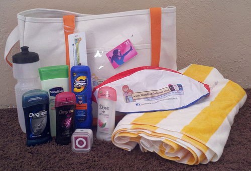 beach bag with deodorant, ipod, towel, beach ball, and itunes card