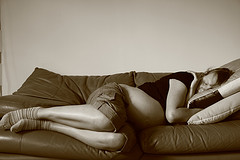 pregnant woman asleep on couch