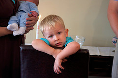 boy on couch looking bored