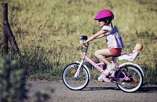 young child riding small bike