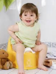 small girl on potty seat