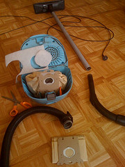 old canister vacuum, taken apart