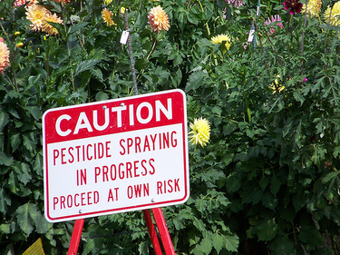 caution pesticide sign