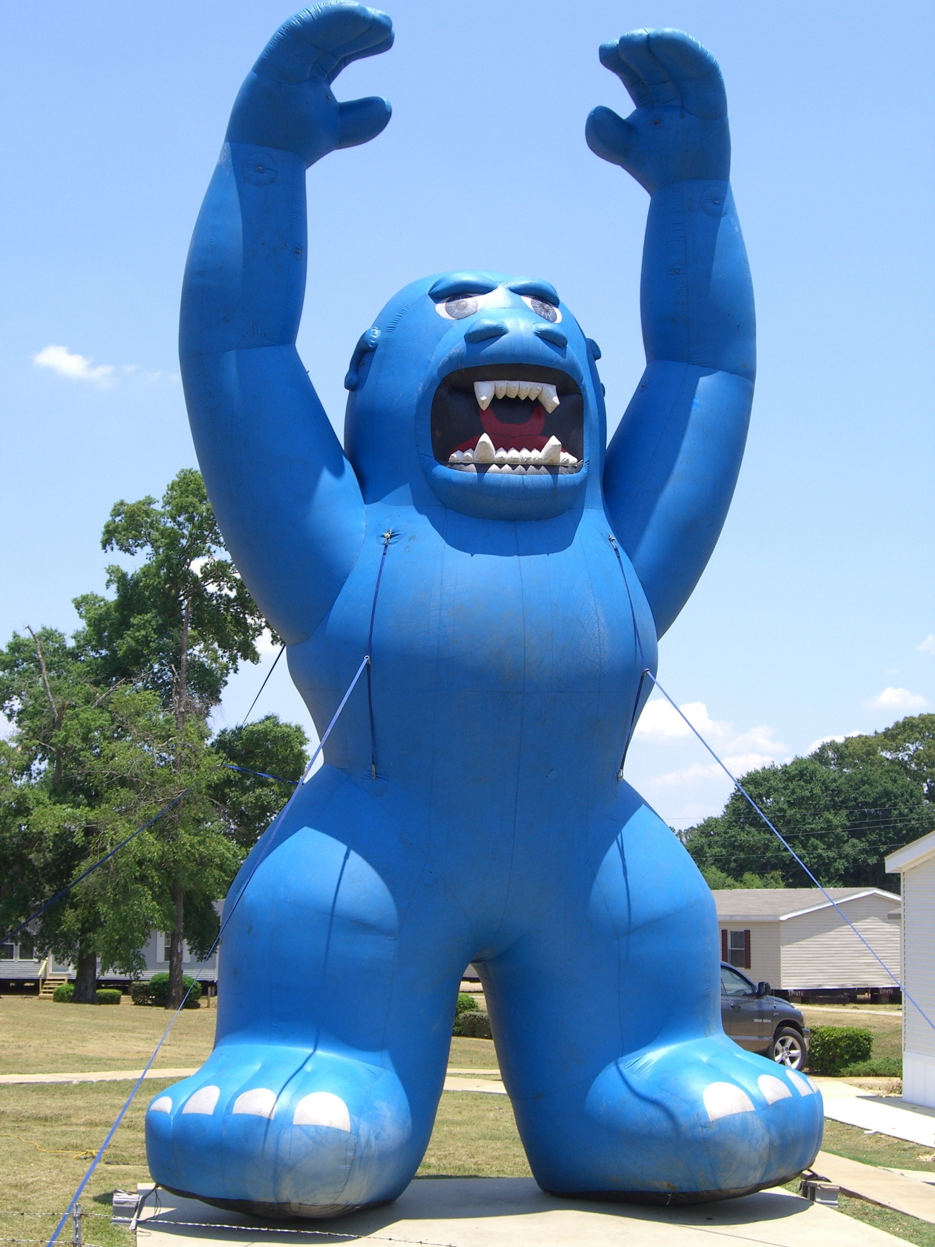 blue inflatable gorilla used at businesses for marketing